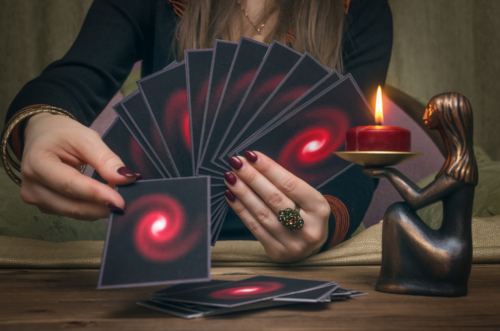 Tarot cards on fortune teller desk table. Future reading concept. Divination.